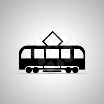 Tram silhouette, side view simple black icon with shadow