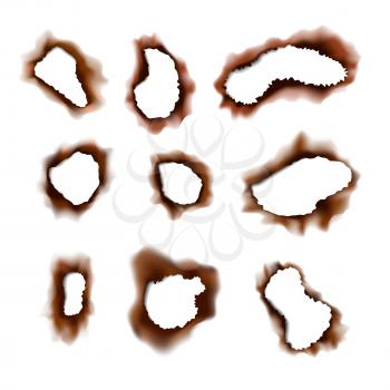Set of burned torn holes in paper on transparent background