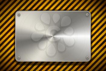 Warning sign yellow and black stripes with polished metal blank plate, industrial background