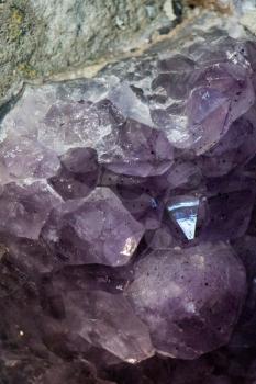 Raw violet amethyst rock with crystal ametist esoteric