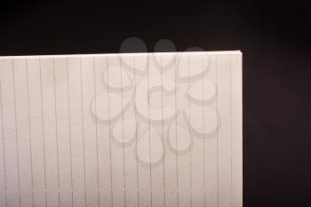 White note book paper with  line in view