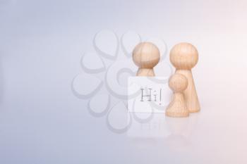 Wooden figurines of  family as concept of caring for children