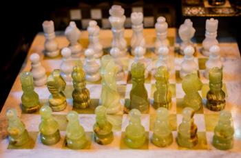 Intellectual game -chess. Wooden chess pieces on the chessboard