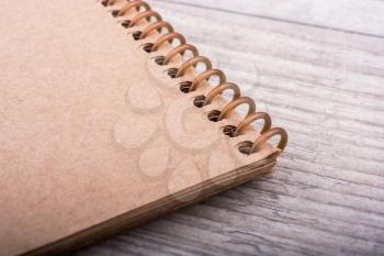 Spiral notebook placed on a grey background