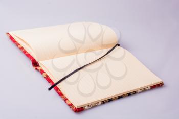 White notebook  on  a white color background inthe  view