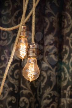 Decorative antique edison style filament light bulbs hanging