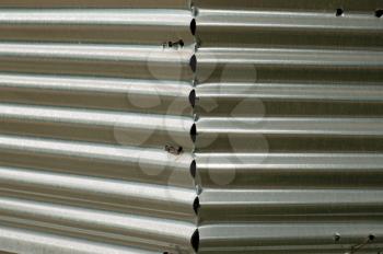 Corrugated sheet metal fence. Abstract industrial background.