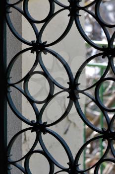 Vintage metal door frame with decorative circles pattern. Abstract background.