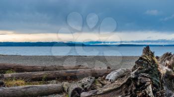 A view of the Puget Sound and cloud-coverd Olympic Mountains.