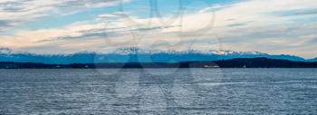 A panorma shot of the snowcapped peaks of the Olympic Mountains in Washington State.