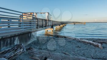 A view of the fishing pier in Dash Point, Washington at high tide.