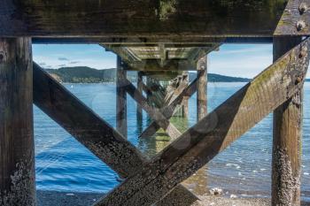Veiw from under the pier at Twahoh State Park in Washington State. The pier is on Hood Canal.