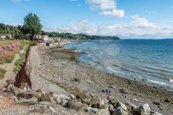 A view of the shoreline with homes and water in West Seattle, Washington.