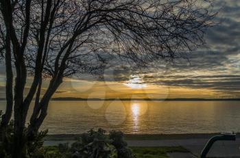 A view of a yellow sunset over the Puget Sound from West Seattle.