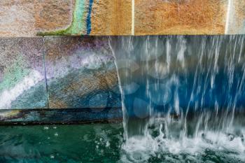 A macro shot of a colorful fountain in West Seattle, Washington.