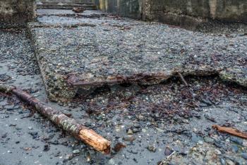 A view of an eroding boat ramp in Des Moines, Washington.