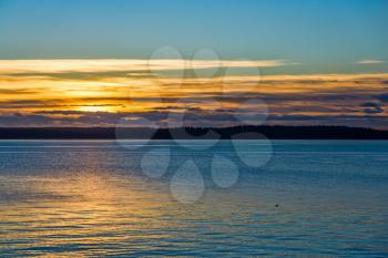 The sun sets on the Puget Sound in the Pacific Northwest.