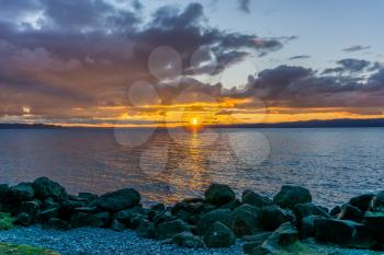 The sun sets over the Puget Sound in Washington State.