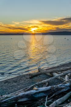 The sun set on the Puget Sound in Burien, Washington.