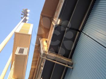 Steel tower structure at baseball stadium, scoreboard for Los Angeles Dodgers on blue sky