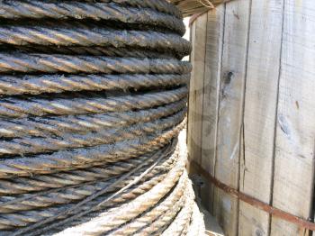 Large strong braided steel wire cable on spool on USS Iowa naval warship destroyer battleship