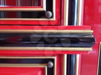 ornate cabinet design details red black lines of wood doors craftsmanship