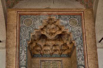 Sarajevo, Bosnia and Herzegovina - 27 February 2019: The ornate wood carved door of a Muslim of Gazi Husrev-beg