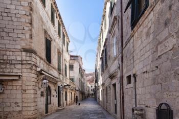 Dubrovnik, Croatia - 21 February 2019: Narrow medieval street by day