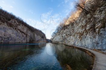 Plitvice Lakes National Park in winter, path in Lower lakes canyon