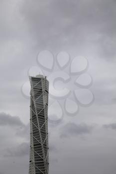 Malmo, Sweden - 13 September 2019 - Beautiful view of the Turning Torso building in front of the dramatic sky, the highest skyscraper in Sweden