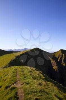 Kallur lighthouse hiking area on a bright sunny day with blue sky