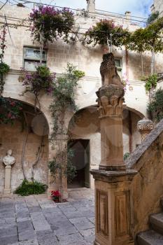 Mdina, Malta - 4 January 2020: Typical patio in arabic Mediterranean style in Falson Palace