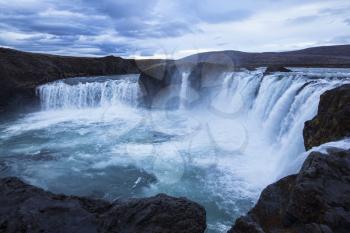 Godafoss waterfall of the gods in Iceland. It is located in the Bardardalur district of Northeastern Region at the beginning of the Sprengisandur highland road.