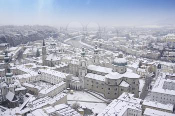 Panoramic view of Salzburg Cathedral in winter with blue sky, Austria