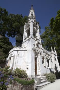 Chapel in Quinta da Regaleira on a bright sunny day.