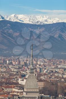 Turin Alps Skyline. View Over the city with rooftops and La Mole Antonelliana.