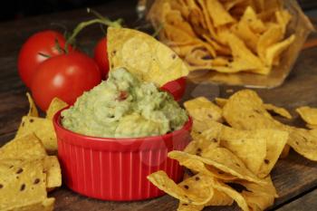 Guacamole dip with corn chips
