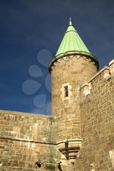 St-John gate in Quebec city, Canada is an UNESCO world heritage treasure.  Cross process to look like an used picture.