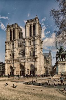 PARIS, FRANCE, MARCH 02 2015: Notre Dame de Paris along the la Seine river in Paris, France.