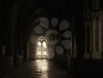 Pale light coming through a window in a cloister