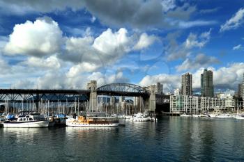 Burrard bridge and yachts in Vancouver by a nice sunny day