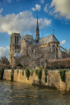 PARIS, FRANCE, MARCH 02 2015: Notre Dame de Paris along the la Seine river in Paris, France.