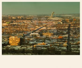 Panorama of Montreal during winter from the mont royal mountain.  Cross processed to look like and aged pictures.  