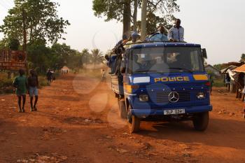 Royalty Free Photo of a Police Vehicle in a Village