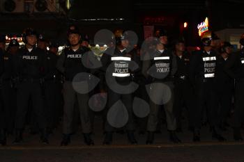 Royalty Free Photo of a Row of Police Officers