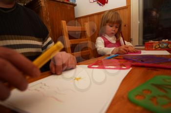 Royalty Free Photo of a Little Girl Doing Crafts