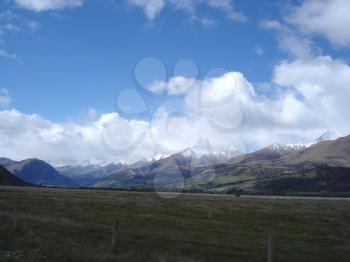 Royalty Free Photo Image of a Road Between Flat Land and Mountains