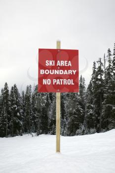 Royalty Free Photo of a Boundary Sign at a Ski Slope Warning of No Patrol
