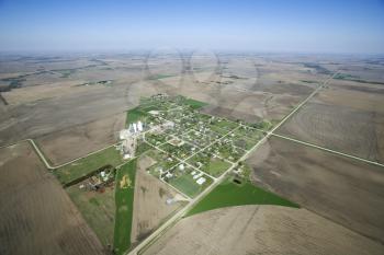Royalty Free Photo of an Aerial View of a Rural Town Surrounded by Cropland and Agriculture
