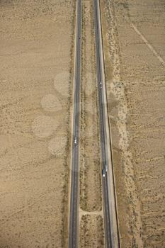 Royalty Free Photo of an Aerial View of an Interstate Through a Desert Landscape